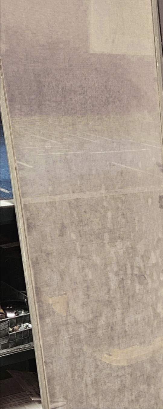 Dusty window screen from a Gilbert home before ScreenRevive cleaning