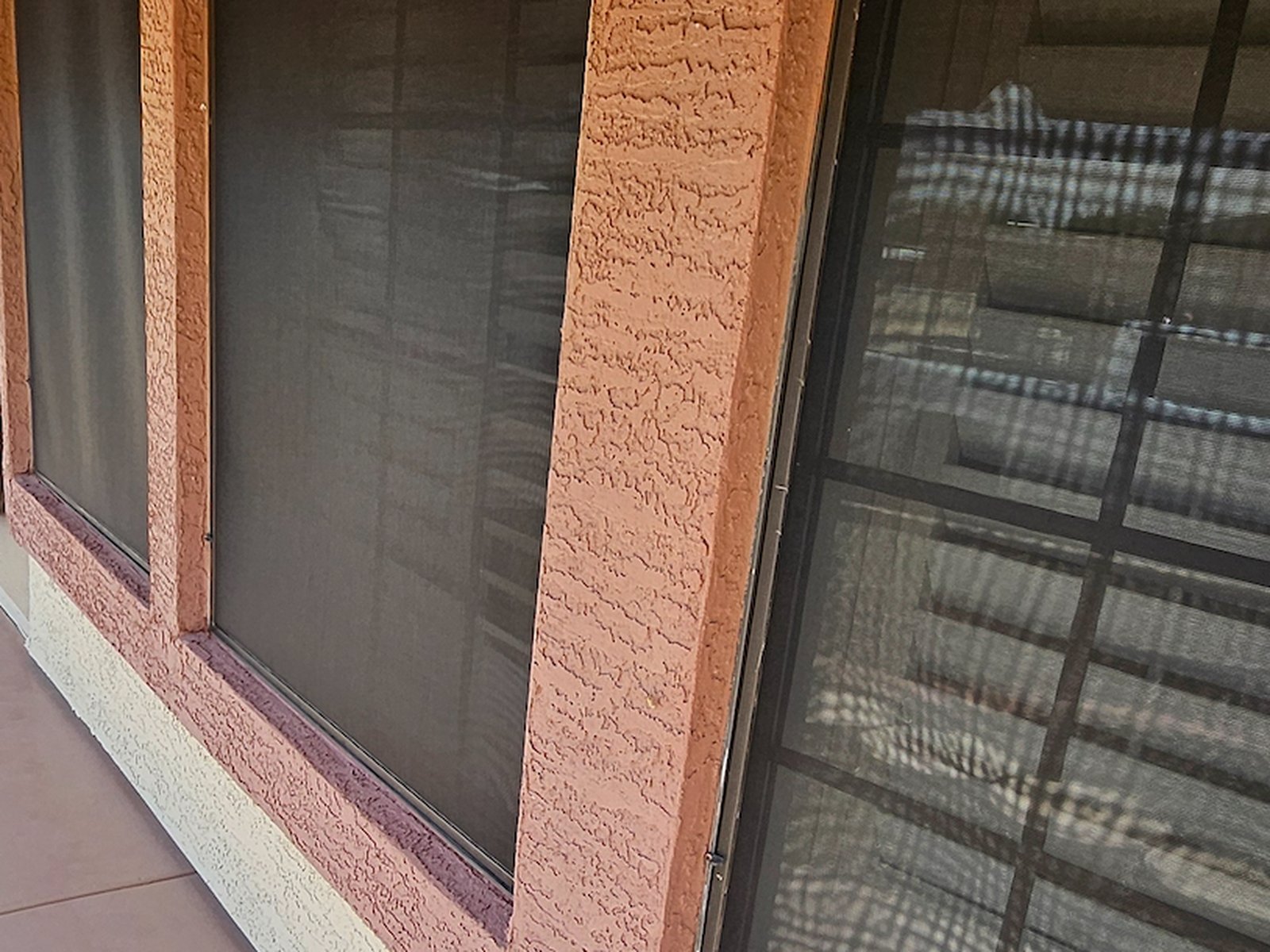 Restored window sunscreens along the walkway of a Sun Lakes commercial property