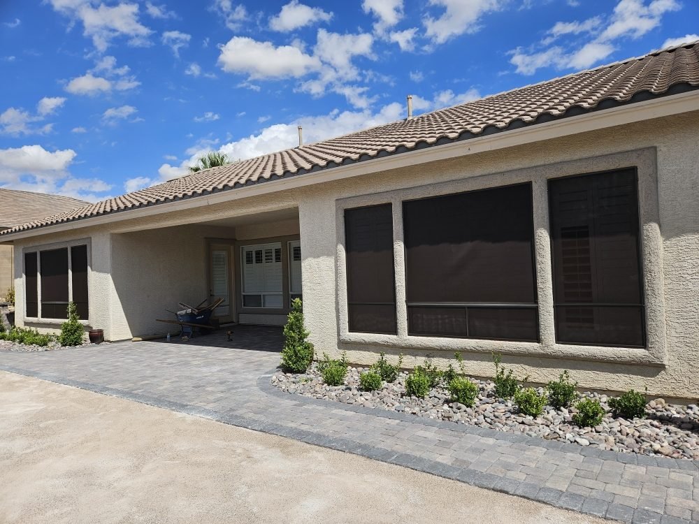 Restored sunscreens across the front windows of a Phoenix home