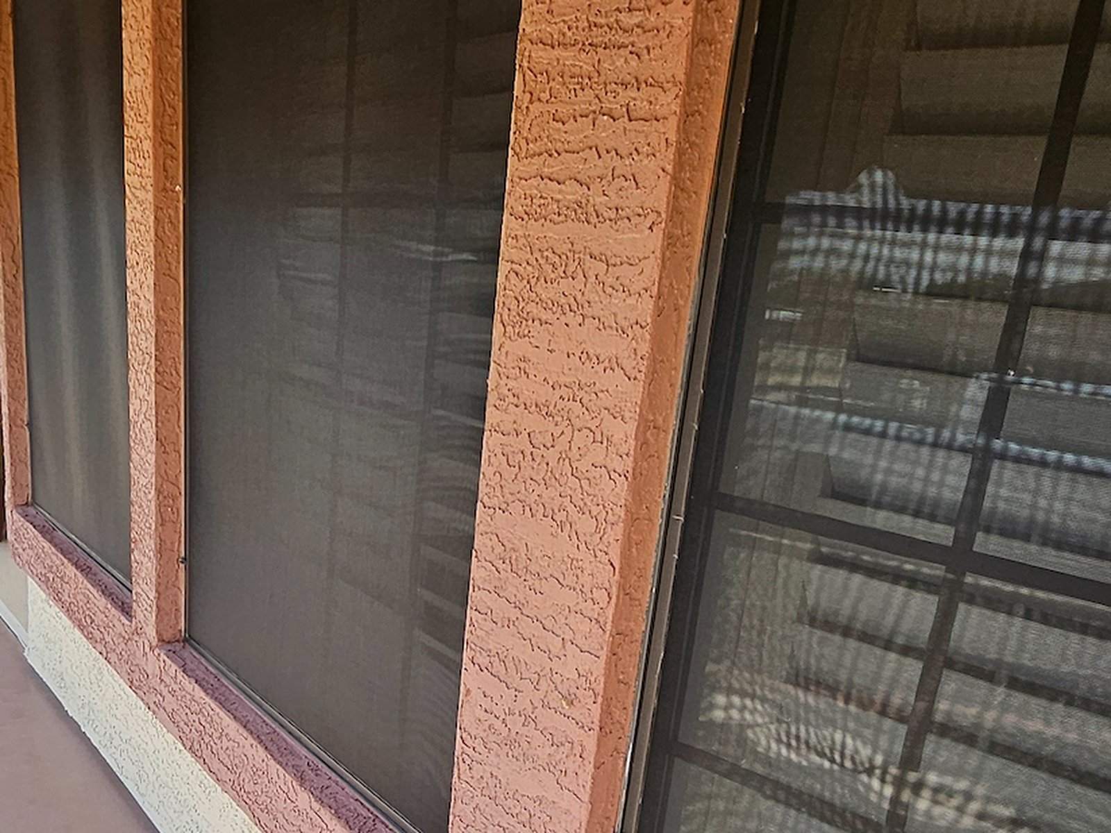 Restored window sunscreens along the walkway of a Sun Lakes commercial property