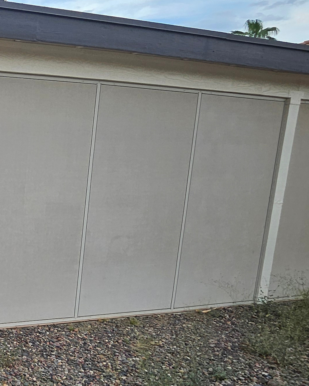 Faded solar shade on a Phoenix home before ScreenRevive cleaning